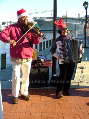 Accordion and Violin Players Singing at the Olde Towne Holiday Music Festival