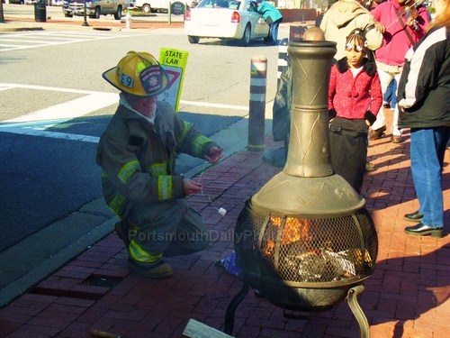 Portsmouth Fire Department Fireman Roasting Marshmallow for Kids